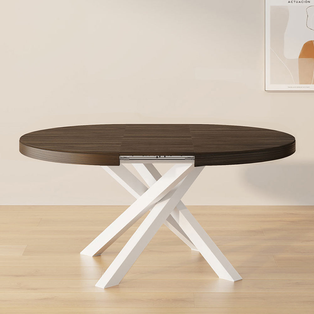 Tavolo Allungabile Rotondo Emma, 120-160 cm, Noce Scuro con gambe Incrociate Bianche - Immagine ambientata 1